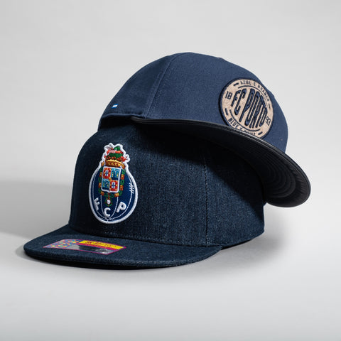 FC Porto 541 Snapback and FC Porto Swach Snapback on a grey background.
