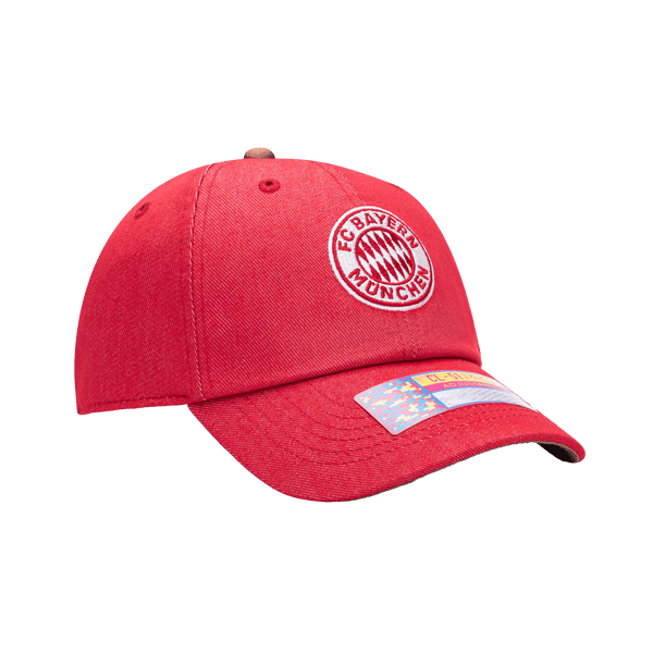 Side view of the Bayern Munich Pegasus Classic hat with low unstructured crown, curved peak brim, and buckle closure, in red.