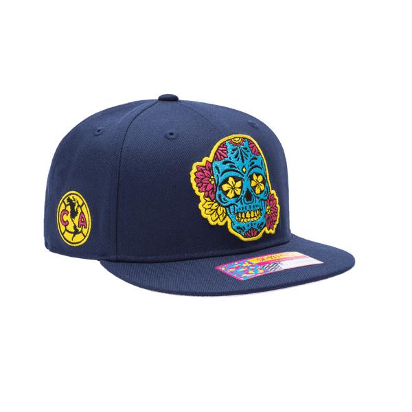 Club America Day of the Dead Snapback Hat with floral skull embroidered on the front, Club America embroidered on the side, "Dia de Muertos" embroidered on the back. The hat has a high crown, flat peak brim, and a snapback closure.