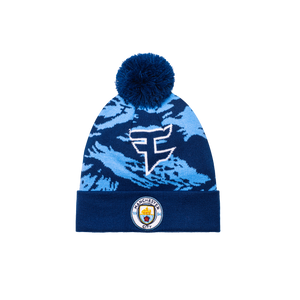 Manchester City Faze clan Collaboration Camo Knit Beanie with a Blue Beanie and a Manchester City Logo on the front