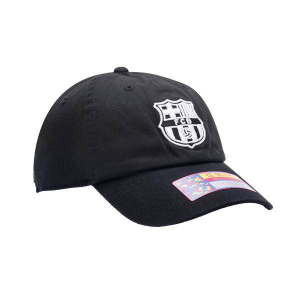 Side view of the FC Barcelona Hit Classic hat with low unstructured crown, curved peak brim, and buckle closure, in black.