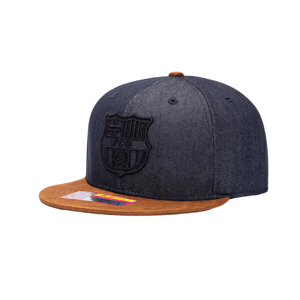 Side view of the FC Barcelona Orion Snapback with high structured crown, flat peak suede-like brim, and snapback closure, in Blue/Brown.