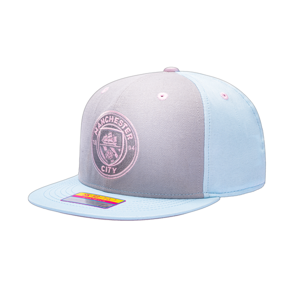 View of left side of Blue grey pink Manchester City Soft Touch Snapback. Grey front panel, blue back panels and bill