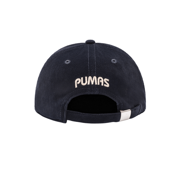 Pumas Princeton Classic Hat in soft fine wale corduroy construction, unstructured low crown, curved peak brim, adjustable flip buckle closure, front embroidered wool backed applique patch with merrowed edges, back embroidered club name, in navy.