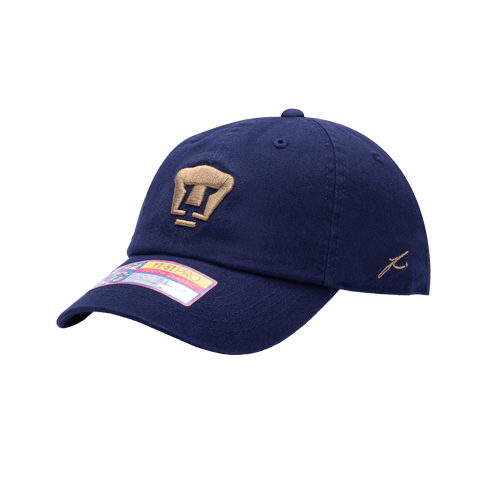 Side view of the Pumas Bambo Kids Classic hat with low unstructured crown, curved peak brim, and buckle closure, in navy.